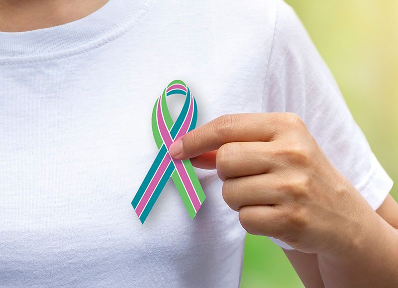 ribbon-on-shirt-800x579 Metavivor Logo on a t-shirt - MBC Awareness West Chester
